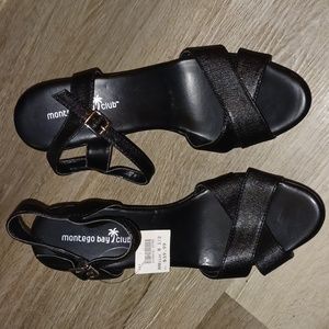 Brand new 8.5 black wedges